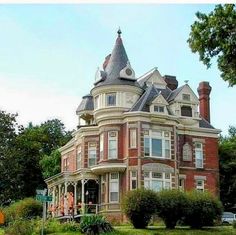 an old victorian style house with a turret