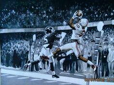 a painting of a football player jumping in the air to catch a ball with his hands