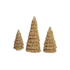 three small straw christmas trees on a white background