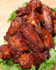 chicken wings with lettuce and sauce on a plate