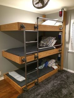 a bunk bed with two sets of stairs