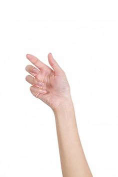 a person's hand reaching up into the air