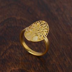 Tree Of Life Ring, Engraved Tree Ring in Gold, Signet Gift, Lace Ring, Stackable Ring, Midi Ring, Filigree Ring, Popular Ring. ♥ DETAILS ♥ *Materials: Brass *Size: All sizes are available. ♥ DELIVERY ♥ *IMPORTANT: Before placing an order, please double check your delivery address is correct and complete to avoid delays and lost packages. *You can return your purchased item within 15 days after successful delivery. *We offer a 100% "Money Back Guarantee" if you are not satisfied with your purchas Matte Gold Brass Rings For Gift, Matte Gold Brass Rings As Gifts, Matte Gold 14k Gold Rings For Gift, Matte Gold 14k Rings For Gifts, Matte Gold Open Ring Perfect As A Gift, Matte Gold Open Ring For Gift, Elegant Matte Gold Rings For Gifts, Oval Gold Midi Rings For Everyday, Everyday Gold Oval Midi Rings