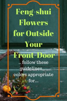 a basket filled with flowers sitting on top of a wooden floor next to a green door