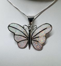 *Brand new * Sterling Silver white Opal butterfly pendant necklaces  *Sterling Silver  *Gemstone: Opal  *Necklace length: 18 inches  * blue opal/Lab Created *Calibrated pre cut stone: blue opal inlay  *Jewelry ship in gift box  *Cabochon may vary color *Free shipping in USA  *Ready to ship Thank You For Looking ,And Check Out More Items In My Etsy Shop For More Great Deals, Also We Add More Jewelry To Etsy Shop  Https://www.etsy.come/shop/abq925 Elegant White Sterling Silver Butterfly Necklace, Sterling Silver White Butterfly Pendant Necklace, White Sterling Silver Butterfly Pendant Necklace, White Butterfly Charm Pendant Necklace, White Pendant Necklace With Butterfly Charm, White Sterling Silver Butterfly Necklace, White Butterfly Jewelry For Gift, White Butterfly Charm Pendant Jewelry, White Butterfly Pendant Necklace As Gift