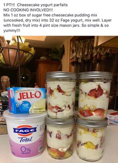 four jars filled with ice cream sitting on top of a counter next to each other