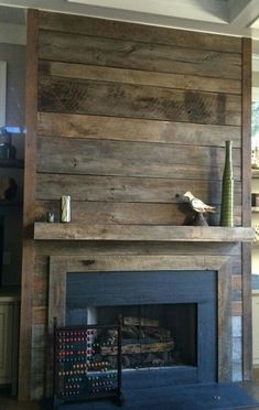 a living room with a fire place and shelves