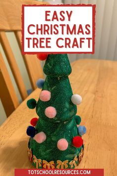 a homemade christmas tree craft made out of toilet paper