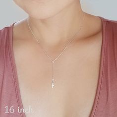 "From my original Delicate Rosary series! A fashion forward, feminine necklace that is perfect for every day! This necklace is my personal fave every day necklace: Lightweight and delicate yet full of sparkle! A teeny tiny, feather light sterling silver cross is strung on sparkling sterling silver chain. Also available in 14K Gold Fill. Necklace shown on model measures 16\". Dangling charm measures an additional 1.75\" Tiny charm measures approx 6mm x 4.5mm ► All NINA KUNA jewels come in a compl 16 Inch Minimalist Charm Necklace For Everyday, Everyday Hypoallergenic Charm Necklaces, Simple Tiny Charm Necklace, Minimalist Charm Necklace 16 Inch, Dainty 16-inch Charm Necklace For Everyday, Dainty Lariat Charm Necklace For Everyday, Dainty Everyday Lariat Charm Necklace, Every Day Necklace, Extra Long Necklace