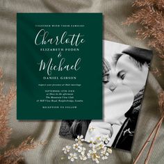 a wedding card with the words charlotte and michael on it, surrounded by dried flowers