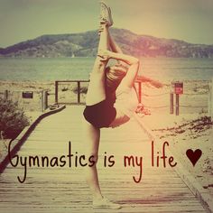 a woman doing a handstand on a dock with the words gymnastics is my life