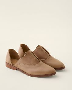 A refined take on an Oxford, with breezy cutouts at both sides and a modern, feminine vamp. Handmade in leather, with slip-on ease and well-cushioned comfort.  By Nisolo.  Slip-on style with internal elastic stretch.  Subtle Oxford seaming on vamp.  Leather-wrapped, shock-absorbing, antimicrobial footbed with premium cushioning.  Slight stacked leather heel.  Leather sole; man-made heel cap. Spring Closed Toe Slip-ons With Leather Lining, Modern Slip-ons With Leather Lining, Modern Feminine, Garnet Hill, Heel Caps, Women's Footwear, Leather Wraps, Leather Heels, Blending