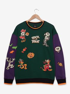 Celebrate Halloween with Mickey and Friends in this crewneck! Featuring color blocked sleeves  this sweater shows off an allover puff print design of Mickey and his pals in Halloween costumes among various spooky icons across the front and back—perfect for any occasion.A BoxLunch Exclusive!60% cotton; 40% recycled polyesterListed in unisex sizesWash cold with like colors; dry lowDo not iron over printImported Spooky Icons, Halloween Color, Mickey Mouse Halloween, Culture Clothing, Feminine Blouses, Color Block Sweatshirt, Puff Print, Mickey Mouse And Friends, Disney Merchandise