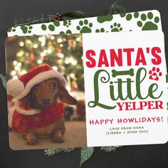 a christmas card with a dog wearing a santa's hat