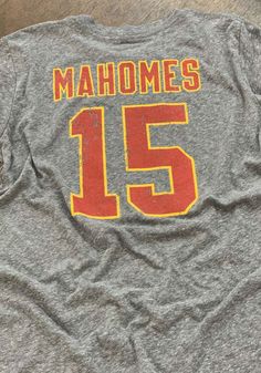 Patrick Mahomes Kansas City Chiefs Grey Name and Number Short Sleeve Fashion Player T Shirt - 18240915 Throwback Sports Team Tops, Throwback Team Tops For Sports Events, Baseball Season Fan Merchandise Top With Team Name, Team Name Tops For Baseball Season Fan Merchandise, Baseball Season Tops With Team Name For Fan Merchandise, Fan Merchandise Tops With Team Name For Baseball Season, Throwback Sports Tops With Team Logo, Throwback Tops With Letter Print For Sports Events, Throwback Tops With Team Name For Baseball Season