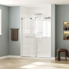 a bathroom with a walk in shower next to a window