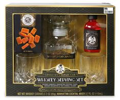 the whisky gift set includes an empty bottle, two shot glasses and a small jar