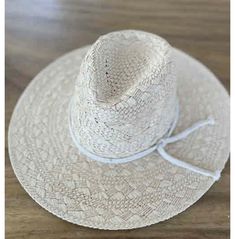 Ideal for beach days, boat trips, gardening and long walks, this straw hat with a strap stays with you through it all. order now at rebelsmarket! Adjustable Coastal Straw Hat Made Of Toquilla, White Straw Hat For Travel, Adjustable White Straw Fedora, Bohemian Straw Sun Hat For Travel, Adjustable Summer Boater Hat In Natural, Adjustable Summer Boater Hat In Natural Color, Adjustable Paper Straw Fedora For Travel, Adjustable Woven Fedora For Beach Season, Palm Leaf Fedora For Beach In Natural Color