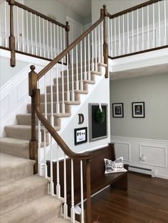 the stairs in this house are white and wood