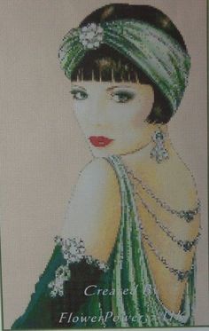 a cross stitch picture of a woman wearing a green dress with pearls on her head