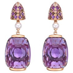 Presented A stunning variety of amethyst gemstones for those who respect quality and wish to wear them on any occasion or everyday basis. The rose gold amethyst earrings, embellished with rhodolite, smoky quartz and diamonds, has a timeless and exquisite appeal. Amethyst Drop Earrings in 18Karat Rose Gold with Rhodolite, Smoky Quartz, and White Diamond. Amethyst: 33.28 carat, 20X15mm size, cushion fancy shape. Rhodolite: 0.33 carat, 1.50mm size, round shape. Amethyst: 0.39 carat, 2.00mm size, round shape. Smoky Quartz: 0.25 carat, 1.70mm size, round shape. Smoky Quartz: 0.13 carat, 1.20mm size, round shape. Smoky Quartz: 0.06 carat, 1.00mm size, round shape. White Diamond: 0.11 carat, 2.50mm size, round shape, G color, VS clarity. Gold: 8.41g, 18Karat Rose Gold. Pin and Push Back E419 Gold Pin, Pearl Gemstone, Amethyst Earrings, Pearl Diamond, Modern Earrings, Amethyst Gemstone, The Rose, Modern Jewelry, 18k Rose Gold