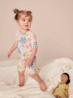 A returning print from our Portual collection that will send them drifting happily off to dreamland. This short-sleeve pajama set is just right for warm weather lounging and bedtime. Crafted of 100% soft cotton rib--brushed inside for extra softness--that will keep your sleepy sweetie pie so cozy but not too toasty. Visit our Global Shop to see more of our favorite styles from around the world. Playful Sleepwear For Pajama Party In Summer, Playful Pink Printed Sleepwear, Playful Pink Sleepwear For Summer, Playful Pink Summer Sleepwear, Playful Summer Sleepwear, Summer Cartoon Print Sleepwear For Sleepover, Summer Sleepover Sleepwear With Cartoon Print, Cartoon Print Bedtime Sets For Summer, Summer Bedtime Sets With Cartoon Print