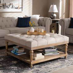 a living room filled with furniture and a coffee table