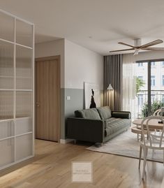 a living room filled with furniture and a flat screen tv mounted to the wall next to a window