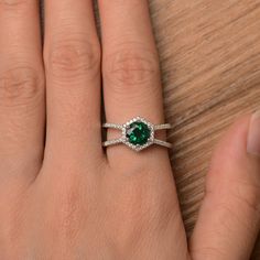 It is a lab emerald ring. The main stone is 7mm*7mm round cut, weight about 1.3 carats. The basic metal is sterling silver and plated with rhodium. To change the metal to a solid gold (white/rose) or platinum is also available, please ask for a quotation if you want. You can also go to my shop Home for more elegant rings: https://www.etsy.com/shop/godjewelry?ref=hdr_shop_menu More lab emerald rings: https://www.etsy.com/shop/godjewelry?ref=seller-platform-mcnav&section_id=20709240 Customizat Silver Engagement Rings Round, Elegant Rings, Emerald Halo, May Birthstone Rings, Emerald Rings, May Birthstone, Elegant Ring, Green Gemstones, 3 Carat