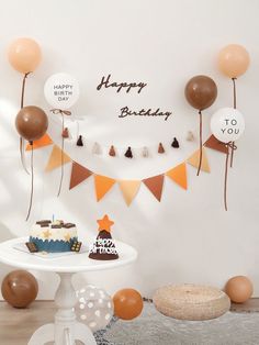 a birthday party with balloons, cake and decorations