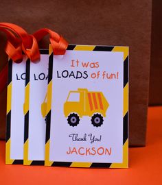 two construction themed thank you cards with an orange ribbon