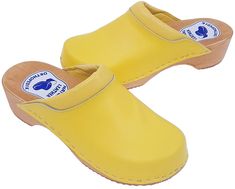 Clogs are made of natural leather + alder wood Instep finished with a soft sponge The sole is made of hard and abrasion-resistant PU material, so it can be used both indoors and outdoors. Ideal for people performing standing and walking work, e.g. shops, school, kitchen, clinic, etc. As well as for everyday use at home Advantages of wearing clogs : - do not chafe, absorb sweat, are anti-allergic, prevent foot fatigue and many others - bottom layer made of polyurethane, non-slip, dampens knocking, occurring during walking and protects the wooden part from the harmful effects of moisture and chemicals. POLISH PRODUCT DESCRIPTION AND DIMENSIONS ~~ MATERIAL: natural laminated leather (top) + alder wood + PU (sole). HEEL HEIGHT : 4,5 cm. COLOUR : YELLOW Size Chart  SIZE EU - 35 insert length - Comfortable Yellow Closed Toe Clogs, Yellow Open Toe Clogs With Rubber Sole, Yellow Synthetic Closed Toe Clogs, Yellow Slip-on Casual Clogs, Yellow Slip-resistant Slip-on Clogs, Yellow Slip-on Clogs With Rubber Sole, Medical Clogs, Clogs And Mules, Alder Wood