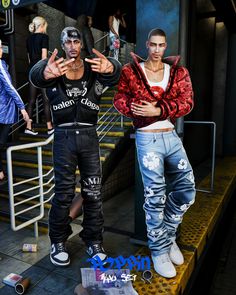 two young men standing next to each other in front of some stairs and railings