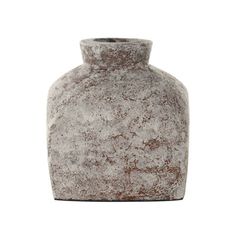 a gray vase sitting on top of a white table