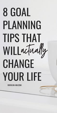 a coffee cup with the words 8 goal planning tips that will actually change your life