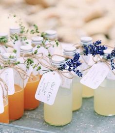 small jars filled with different types of liquid