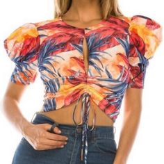 Color - Tropical Print A Charming Cropped Top Featuring An Open Back With A Front Tie Waist Peplum Hem. 95% Polyester, 5% Spandex Ditsy Floral Blouse, Ripped Workout, Satin Bralette, Cold Shoulder Crop Top, Cutout Crop Top, Turtle Neck Crop Top, Bandeau Crop Top, Embroidered Crop Tops, Crop Bra