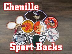 there are many sports stickers on the wooden table with words that read, chenille sport backs