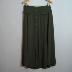 Torrid Midi Skirt Button Front Olive Green Rayon Size 2x Waist 40, Relaxed Before Stretching Length 34 Ins New With Tags Casual Relaxed Maxi Skirt With Button Closure, Flowy Maxi Skirt With Button Closure, Casual Flared Maxi Skirt With Buttons, Flowy Skirt Bottoms With Button Closure, Buttoned Flowy Flared Skirt, Green Button-up Bottoms, Casual Maxi Skirt With Button Closure For Work, Casual Workwear Maxi Skirt With Button Closure, Casual Flowy Maxi Skirt With Button Closure