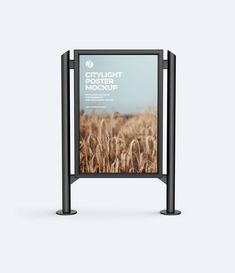 an outdoor sign stands in front of a gray background with the words, city light street mockup