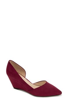 A pointed-toe pump offers chic style with a half d'Orsay silhouette lifted by a wrapped wedge heel. 2 1/2" heel Cushioned footbed Synthetic upper and lining/rubber sole Imported Burgundy Almond Toe Boots Medium Width, Burgundy Heels With 4-inch Heel For Office, Red 4-inch Heel Court Shoes For Office, Red 4-inch Heel Kitten Heels For Formal Occasions, Synthetic Pointed Toe Wedge Sandals With 4-inch Heel, Wedge Pump, Wedge Pumps, Kenneth Cole Reaction, Kenneth Cole