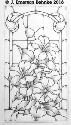 a stained glass window with flowers in the center and an ornate frame above it that reads j emerson behnke 2016