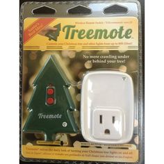 an electrical outlet with a christmas tree on it's cover and the box is open