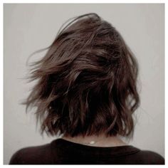 the back of a woman's head with long hair