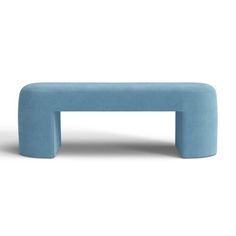 a blue bench sitting on top of a white floor