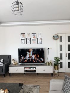 the living room is clean and ready to be used as a home entertainment center for entertaining