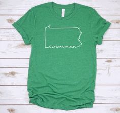 Show that you SWIM your STATE with this super soft tee shirt! *I will use either black or white for the text depending on the shirt color you choose. If you have a preference please let me know in the notes section. *COLORS: Colors may vary slightly from as they appear on your monitor. These tees are all heathered tees. I choose them because they are the softest possible and they feel amazing! If you're looking for a more solid/primary color not shown, feel free to message me. I can pull some ot Summer Tri-blend Ring-spun Cotton Top, Pre-shrunk Tri-blend Summer Shirt, Summer Pre-shrunk Ring-spun Cotton Shirt, Swim Team Shirts, Swim Team, Team Shirt, Swim Shirts, Team Shirts, I Choose