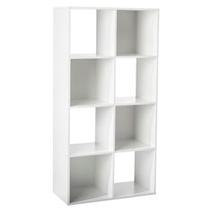 a white bookcase with four shelves on each side