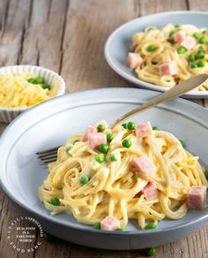 ham tetrazzini no canned soups on two plates with peas and parmesan cheese