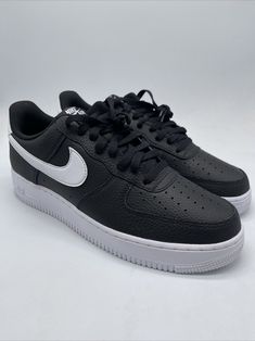 Elevate your sneaker game with these Nike Air Force 1 Low Top sneakers. The stylish black and white design, featuring a colorful theme, is perfect for any athletic occasion. Made with high-quality leather and CT2302-002 style code, these sneakers are sure to impress. The sizes 11-16 fit is perfect for men who want to make a statement with their footwear. Whether you're hitting the gym or just running errands, these Nike Air Force 1 sneakers are the perfect addition to your shoe collection. Don't miss out on this must-have sneaker release from 2021. Air Force 1 Black And White, Nike Air Force 1 Black, Air Force 1 Sneakers, Sneaker Release, Nike Air Force 1 Low, Sneaker Games, Air Force 1 Low, Low Top Sneakers, Black And White Design